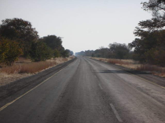 transitroadthroughchobenationalparkbotswanaitisthefirsttarmacroadwedroveinaparkonourtrip.jpg