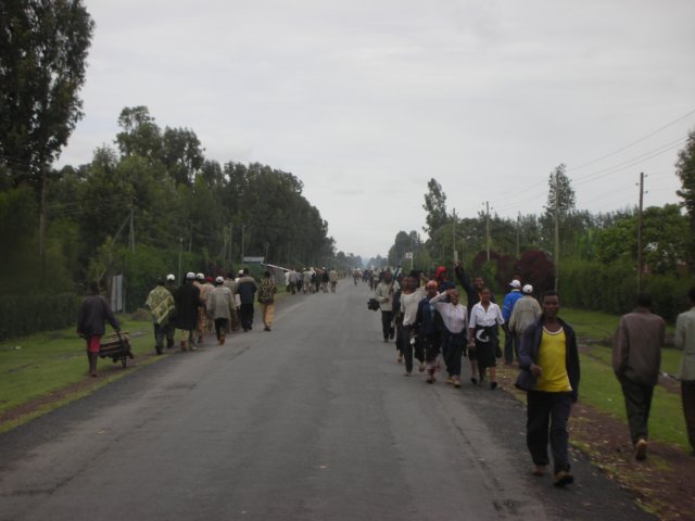 typicalroadinethiopiatherearealwaysmanypeopleeverywherebutthereislittlevehicletraffic.jpg