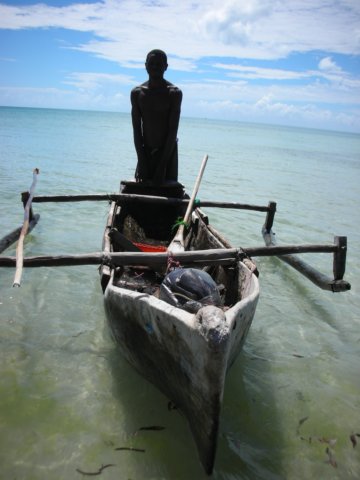 thefishermanheardourcallsandweconvincedhimtotakeusonhislittleboat.jpg
