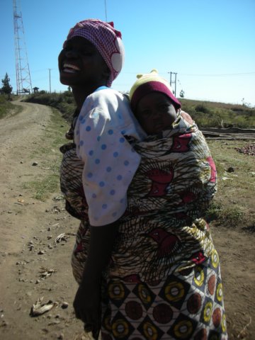 typicaltanzanianwomenthemajoritycarriesababyontheback.jpg